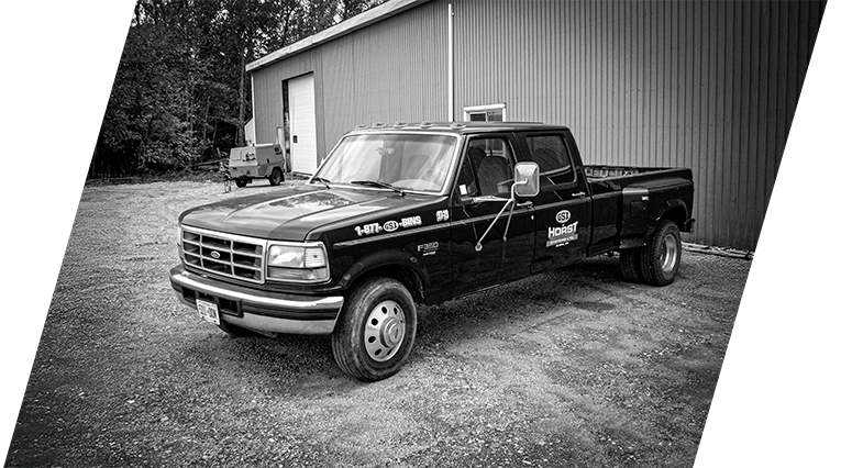 Historic Horst Systems service truck in front of workshop